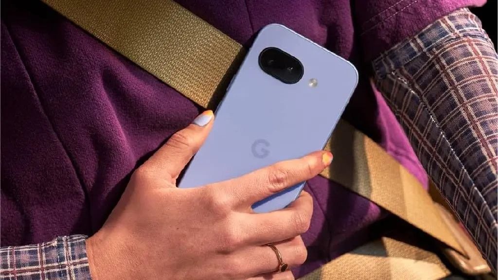 Iris Google Pixel 9a held in someone