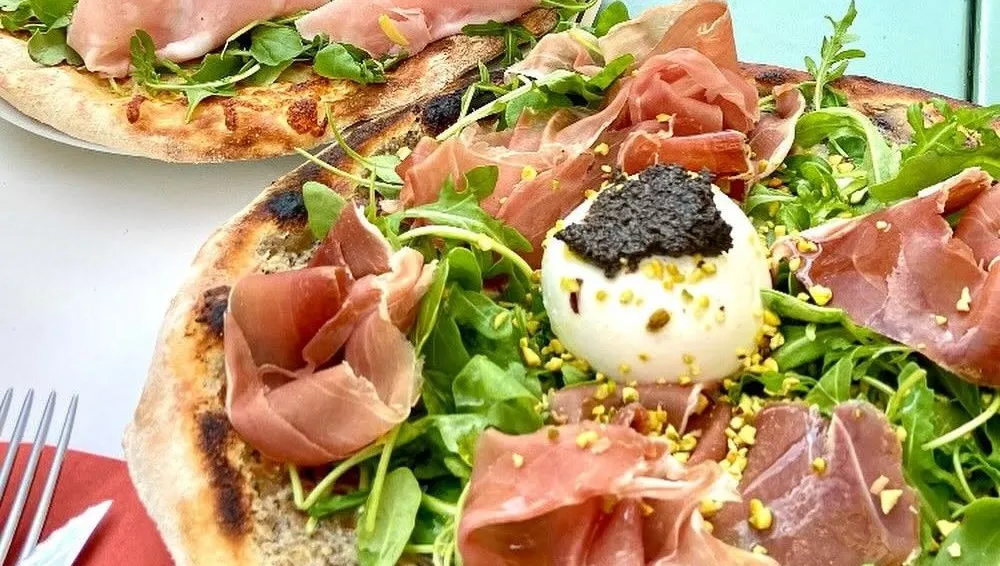 Voyage culinaire : 43 ans de gastronomie italienne entre Amalfi et Caen