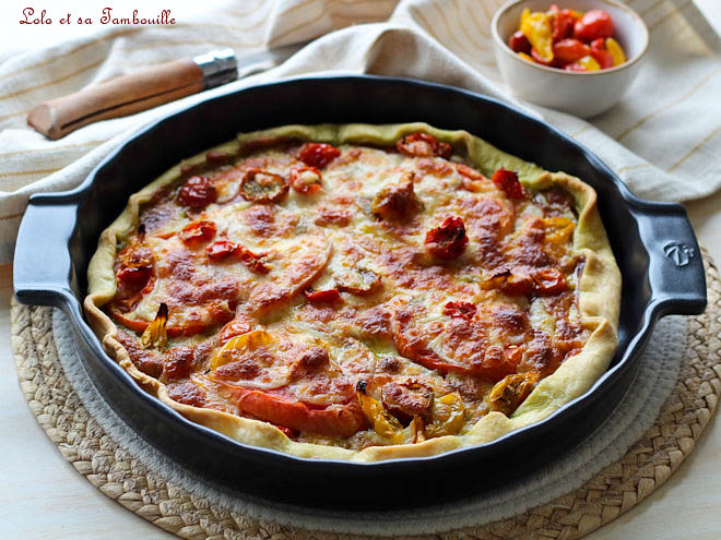 Tarte express au pesto, tomates et mozzarella : une recette rapide et savoureuse.