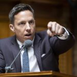 Un député UDC qualifie le PS de cancer socialiste lors d’un débat en Suisse.
