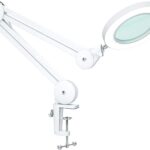 Éclairage LED de précision : Lampe grossissante avec verre de 105 mm et bras pivotant.