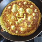 Recette d&rsquo;omelette à la courgette présentée par Gigi dans son émission culinaire.