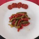 Recette de salade de poivrons marinés présentée par Gigi dans son émission culinaire.