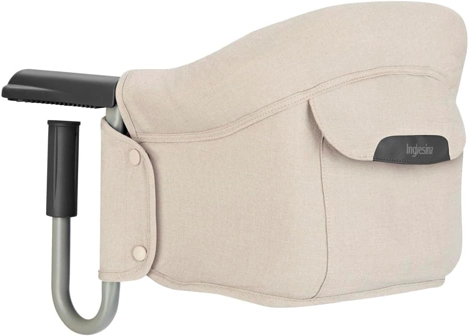 Siège de table pliant Inglesina : transport facile, installation sécurisée, capacité de 15 kg.