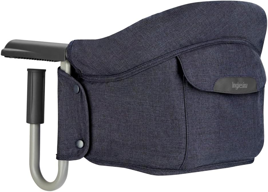Inglesina Fast Folding Table Seat : installation sécurisée jusqu’à 15 kg, facilement transportable et lavable.