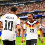 Dortmund fixe un prix de transfert élevé pour Nmecha, suscitant des interrogations sur son avenir.