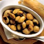 Recette d&rsquo;échalotes au vinaigre avec raisins secs : préparation et conseils pratiques.