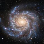 Des astronomes identifient une force invisible maintenant la rotation rapide des galaxies.