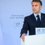 Macron annonce un réarmement lors du défilé du 14-Juillet, soulignant les enjeux de défense.