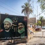 En Irak, des factions pro-iraniennes refusent de désarmer et maintiennent leurs armes.
