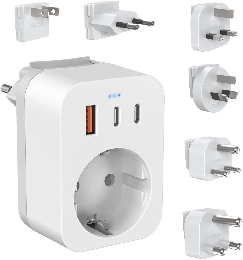Adaptateur de voyage international avec USB C : 6 fiches interchangeables pour divers pays.