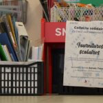 Collecte solidaire de fournitures scolaires pour familles en difficulté financière.