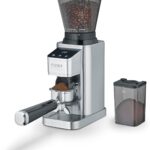 CASO BaristaChef : Moulin à café électrique en inox résistant avec porte-filtre intégré.