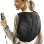 Maximex présente un masseur dorsal et cervical à 4 fonctions en plastique anthracite, dimensions 23,5 x 35 x 17 cm.