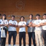Un étudiant du MIT aide des jeunes scientifiques à tester leur expérience au CERN