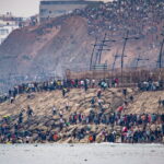 Crise migratoire à Ceuta : afflux massif de migrants marocains en raison de tensions locales.
