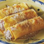 Recette de cannellonis à la viande et à la ricotta pour un repas italien traditionnel.