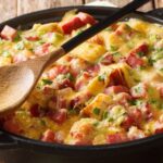 Gratin de pommes de terre, jambon et fromage : une recette simple avec œufs au four